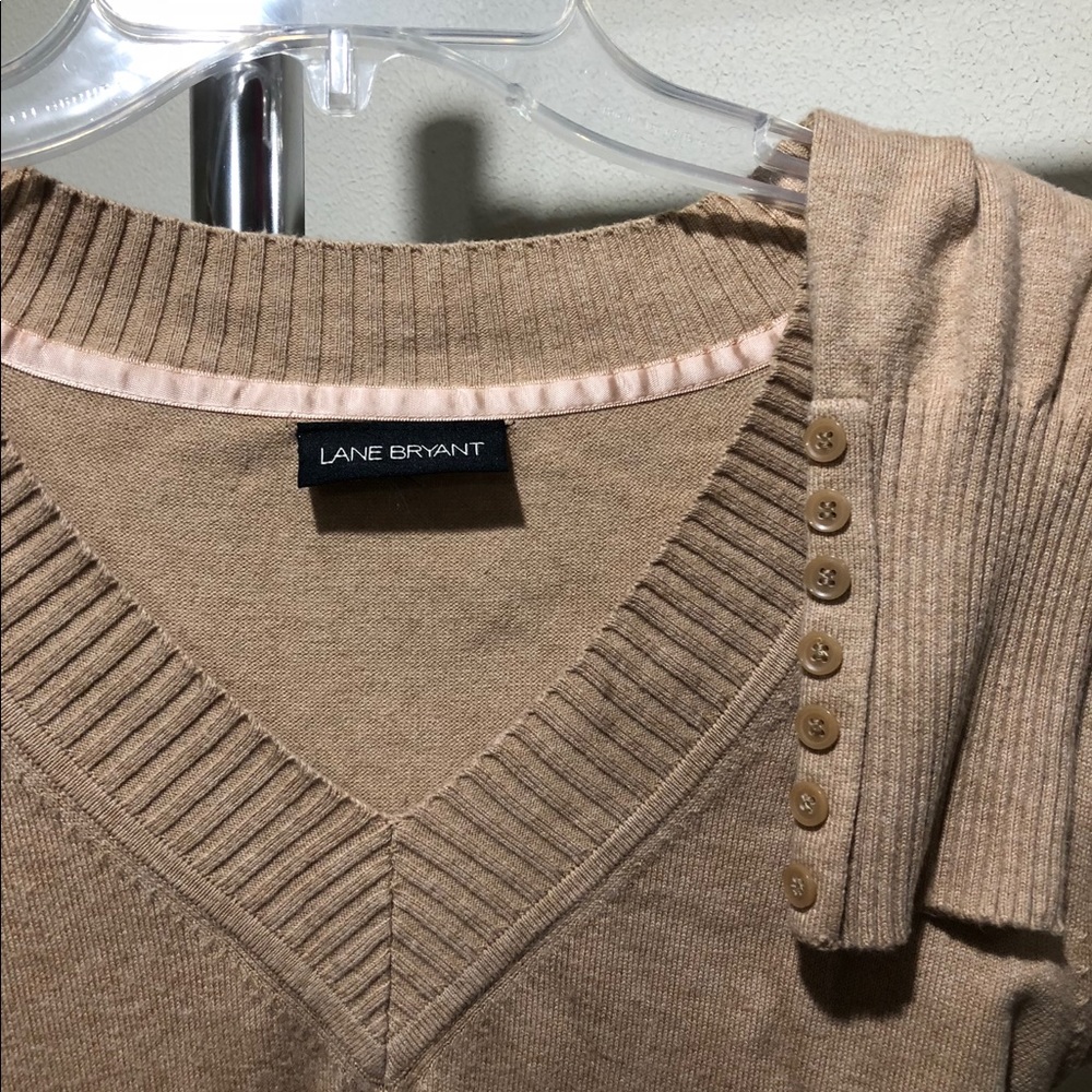 Boyfriend length v neck sweater.